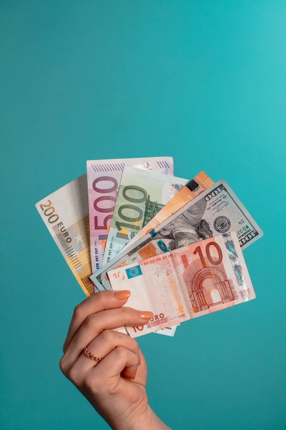 Chinese yuan banknotes — cash remains universally accepted in small shops, taxis, buses, and markets